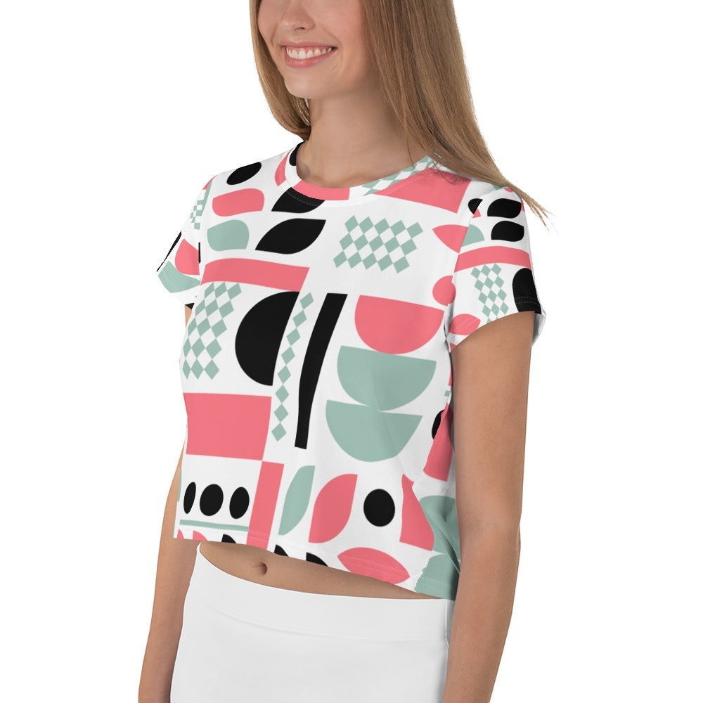 Good Wishes 365 crop tee with pink, mint, and black geometric abstract print on a white background
