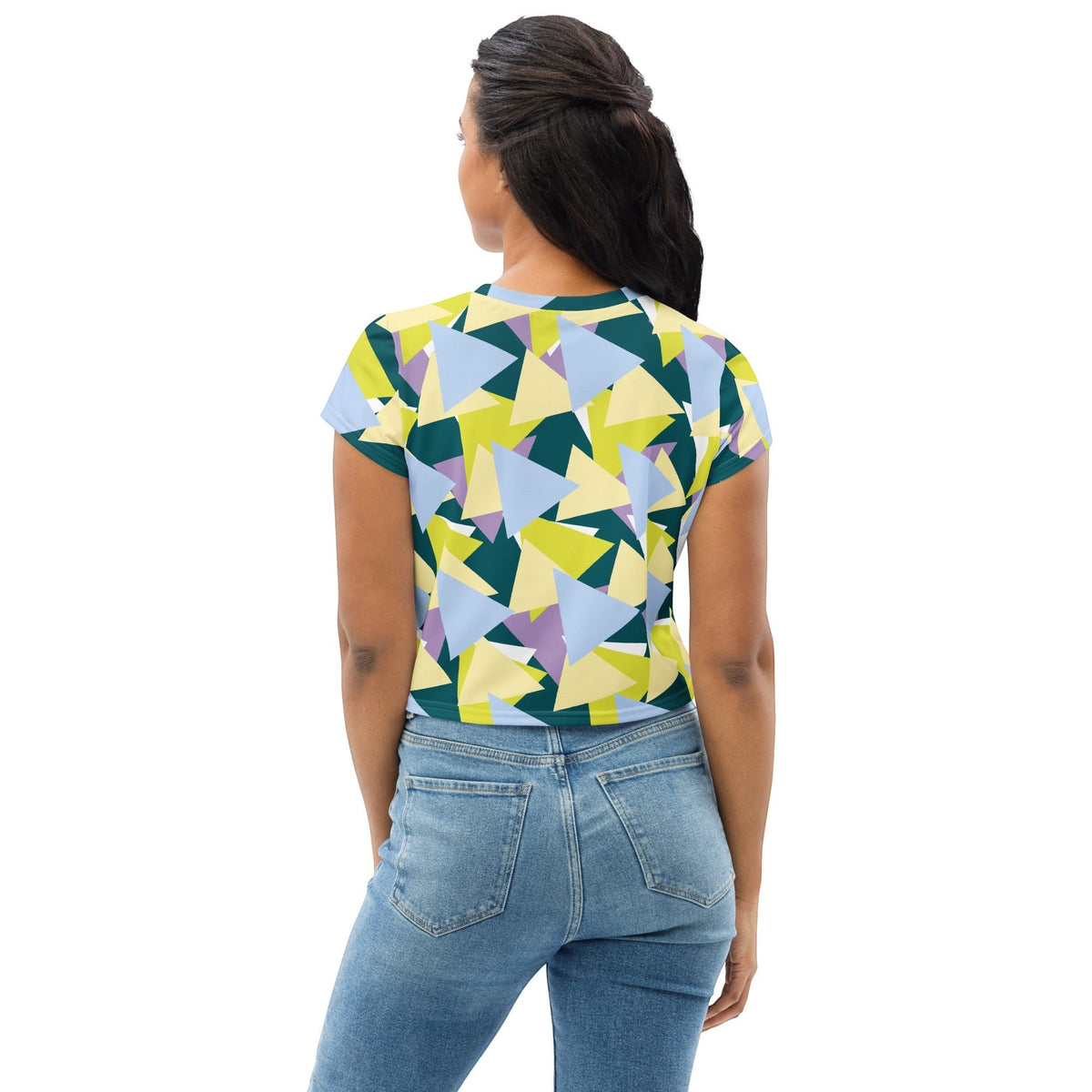 Good Wishes 365 crop tee with a multi-colored geometric triangle pattern worn by a woman from the back view.