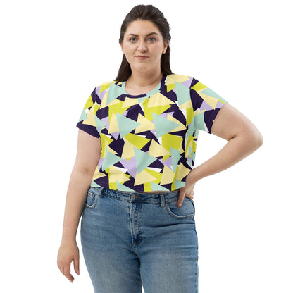 Good Wishes 365 model wearing a multi-colored geometric triangle print crew neck crop tee with blue jeans