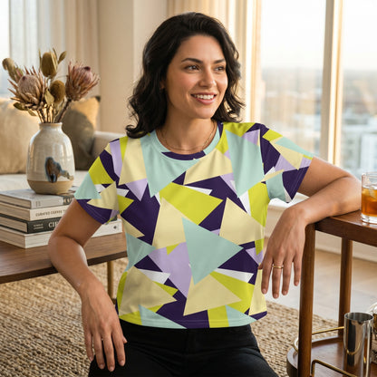 Good Wishes 365 crop tee with a geometric triangle print in lime green, purple, and mint, worn by a smiling woman.