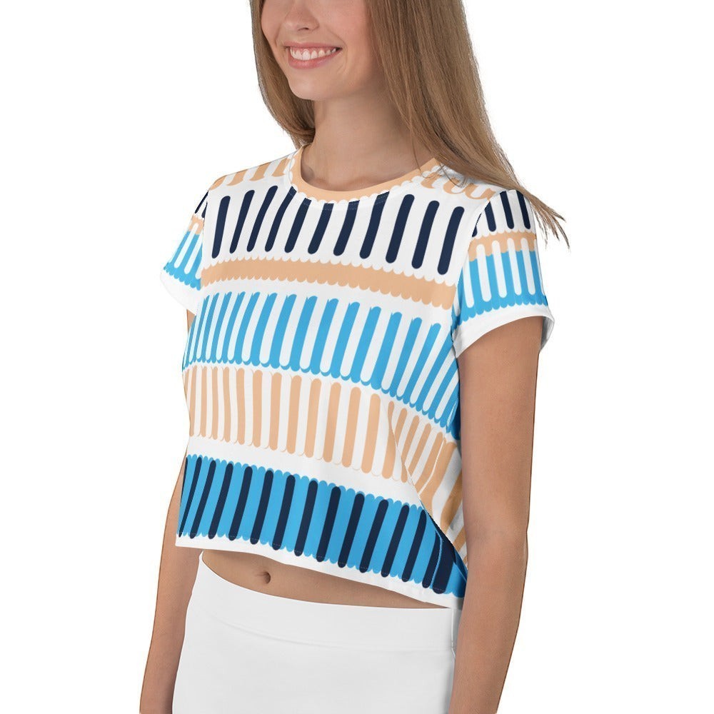Good Wishes 365 geometric print crop tee in blue and peach with crew neck and short sleeves on a smiling model