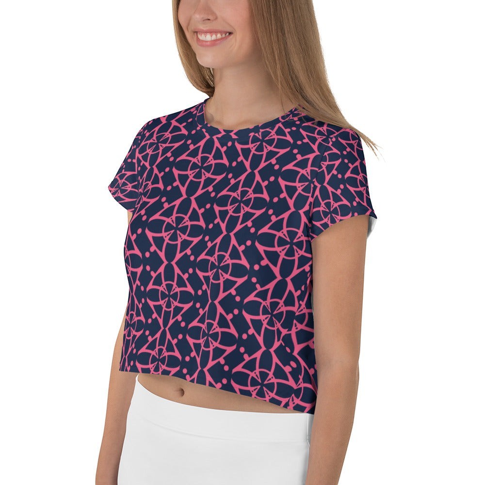 Good Wishes 365 navy blue crop tee with vibrant pink geometric pattern, crew neck, and short sleeves on a model.