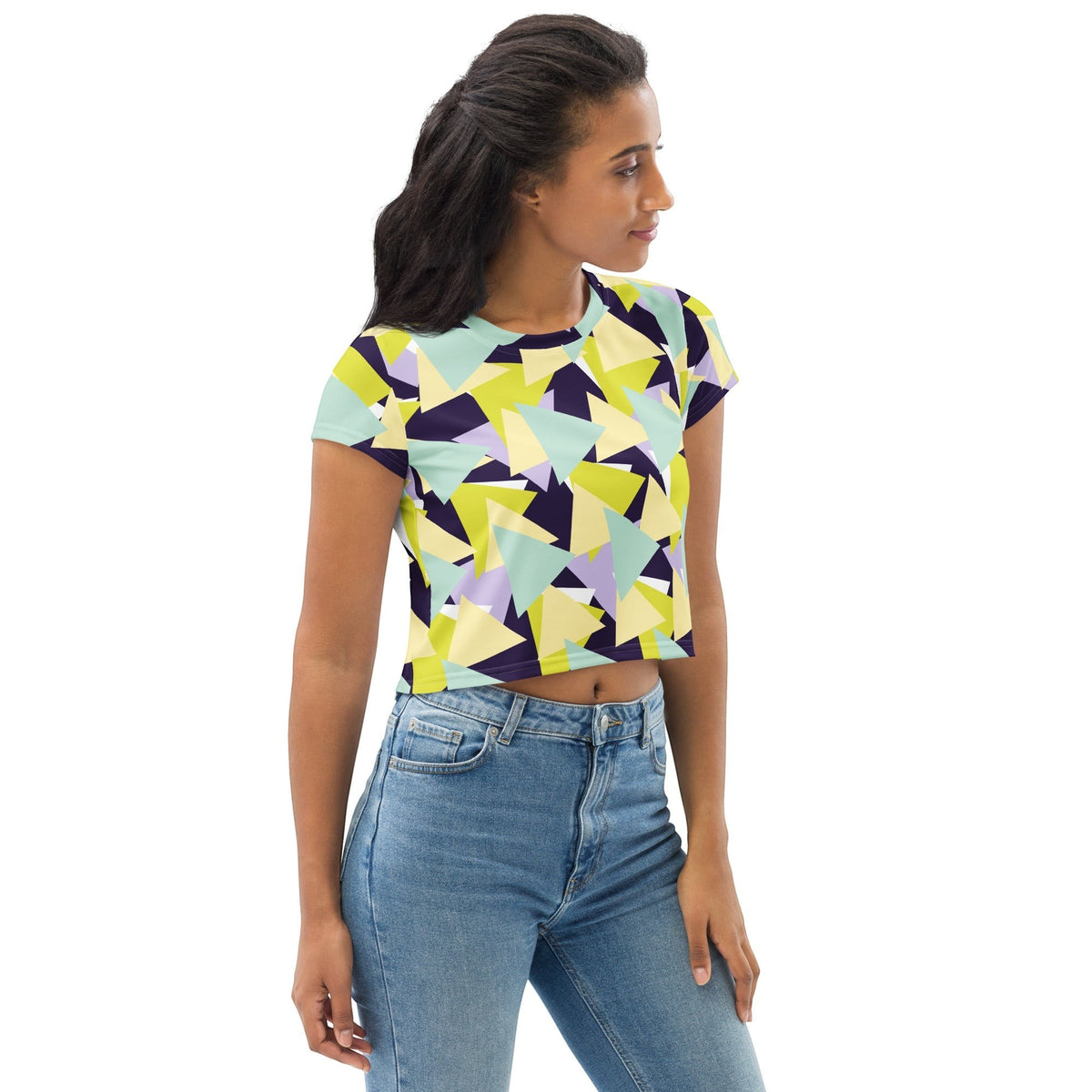 Good Wishes 365 model wearing a multi-colored geometric triangle print crew neck crop tee with blue jeans