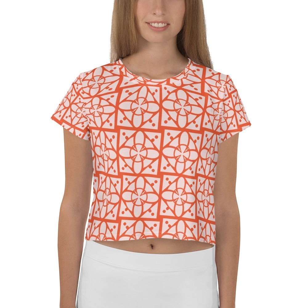 Good Wishes 365 crop tee with orange and white geometric floral pattern, made from stretchy mid-weight jersey fabric.