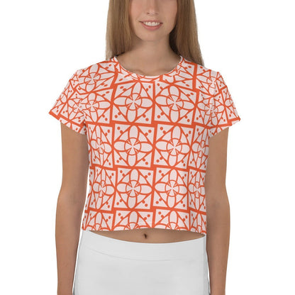 Good Wishes 365 crop tee with orange and white geometric floral pattern, made from stretchy mid-weight jersey fabric.