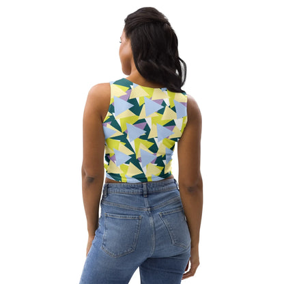 Good Wishes 365 sleeveless crop top with a geometric triangle print in lime, blue, teal, and lavender on a model.