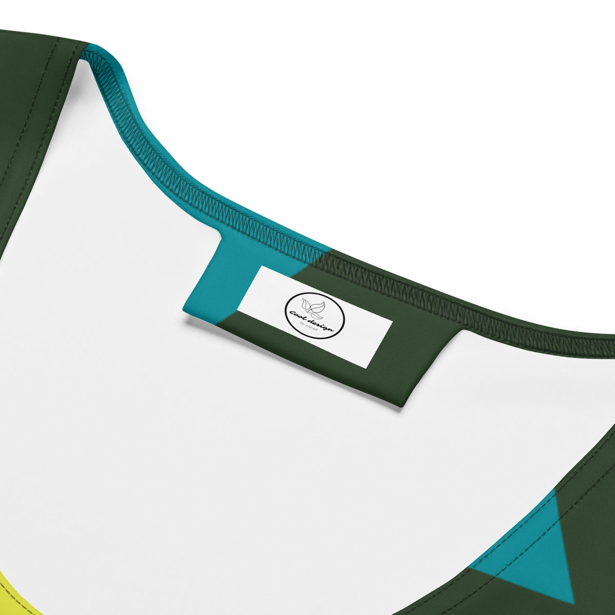 Good Wishes 365 crop top featuring a scoop neckline and vibrant geometric triangle print in olive, teal, and yellow.