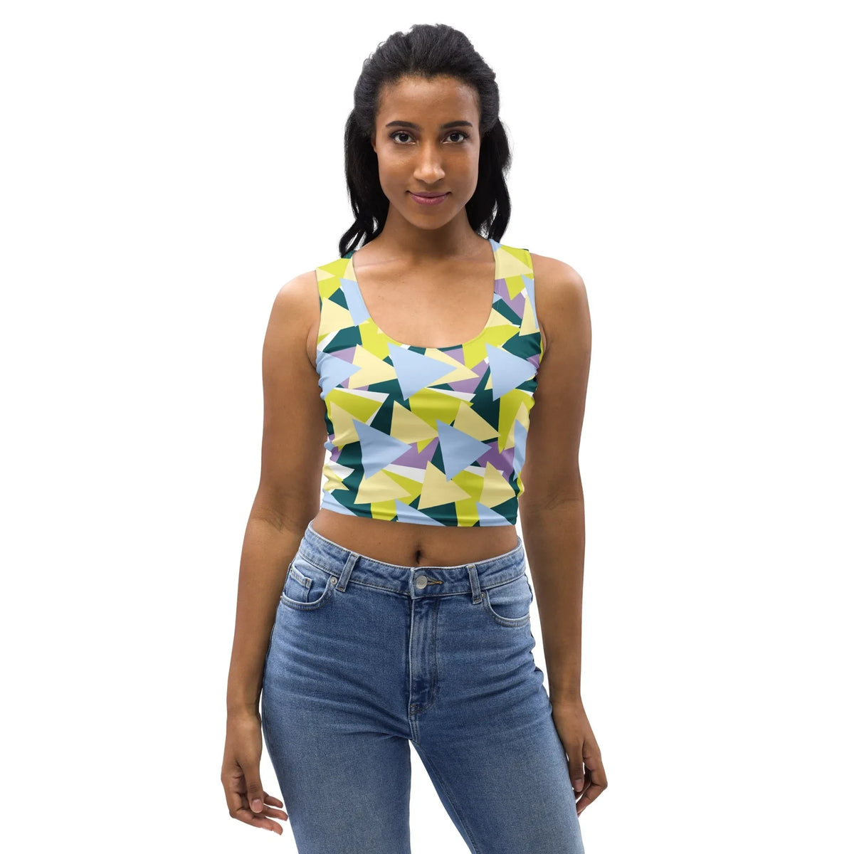 A model wearing a Good Wishes 365 sleeveless crop top with a lime, blue, teal, and lavender geometric triangle print.