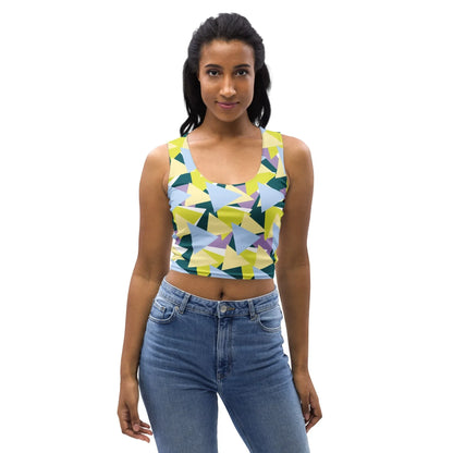 A model wearing a Good Wishes 365 sleeveless crop top with a lime, blue, teal, and lavender geometric triangle print.