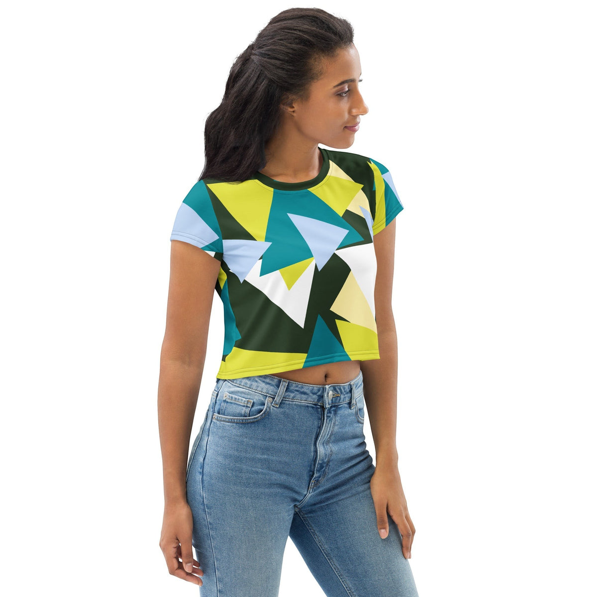 Good Wishes 365 model wearing a short sleeve crop top with a forest green, lime, and sky blue geometric triangle print.