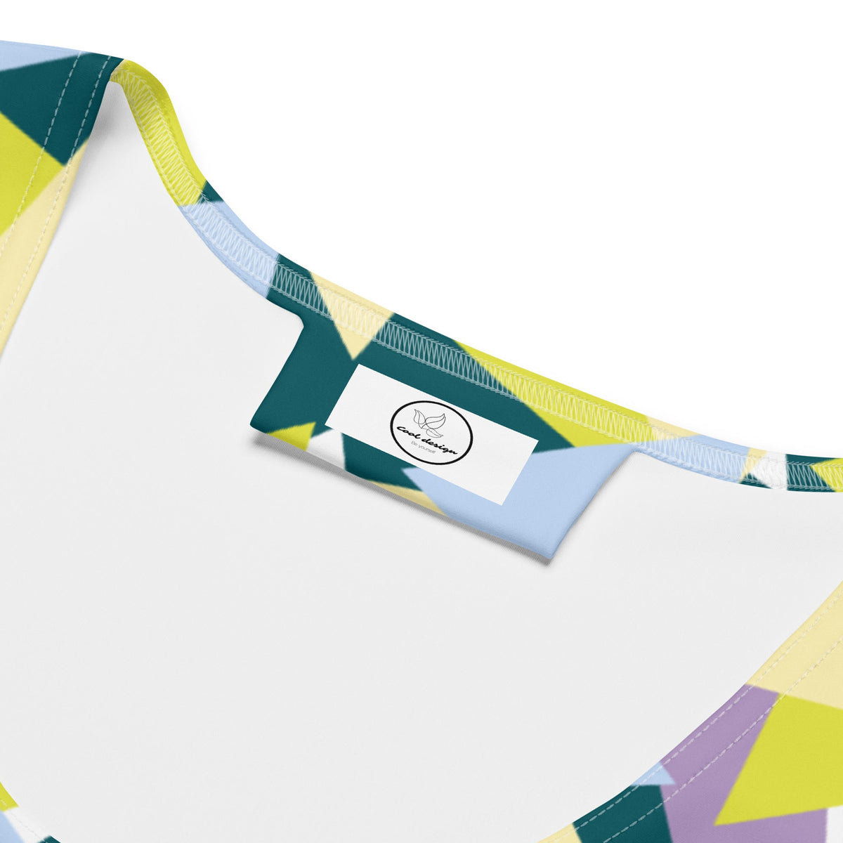 Good Wishes 365 crop top featuring a vibrant geometric triangle pattern in lime, teal, blue, and lavender.