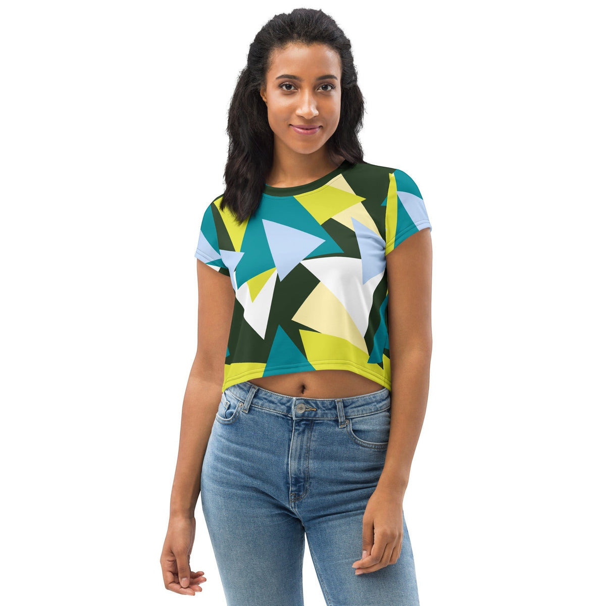 Good Wishes 365 model wearing a short sleeve crop top with a forest green, lime, and sky blue geometric triangle print