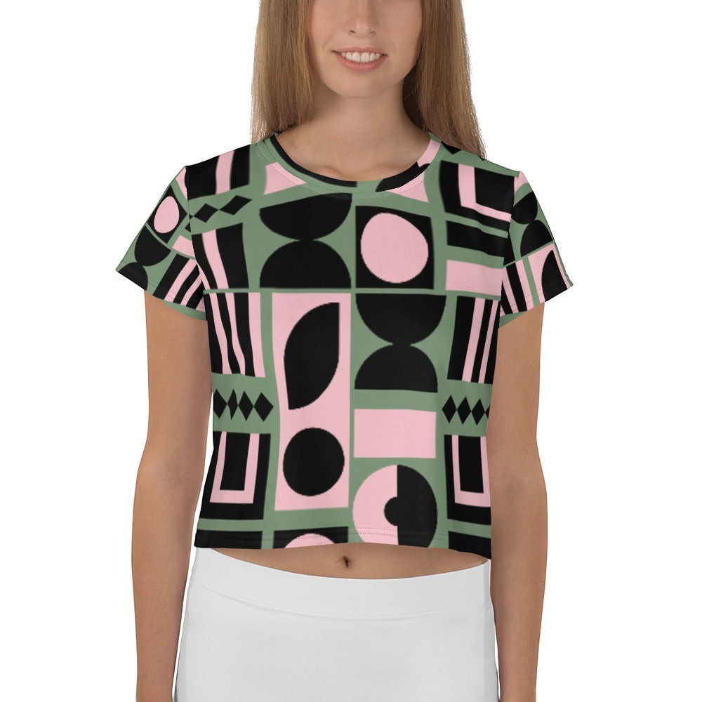 Good Wishes 365 cropped t-shirt with a sage green, pink, and black abstract geometric print and crew neckline.