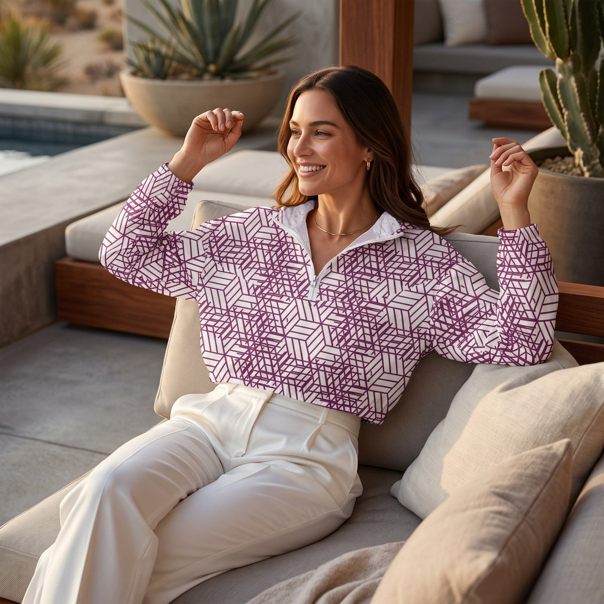 Good Wishes 365 women's cropped windbreaker with purple geometric trapezoidal print, half-zip, and hood on a model.
