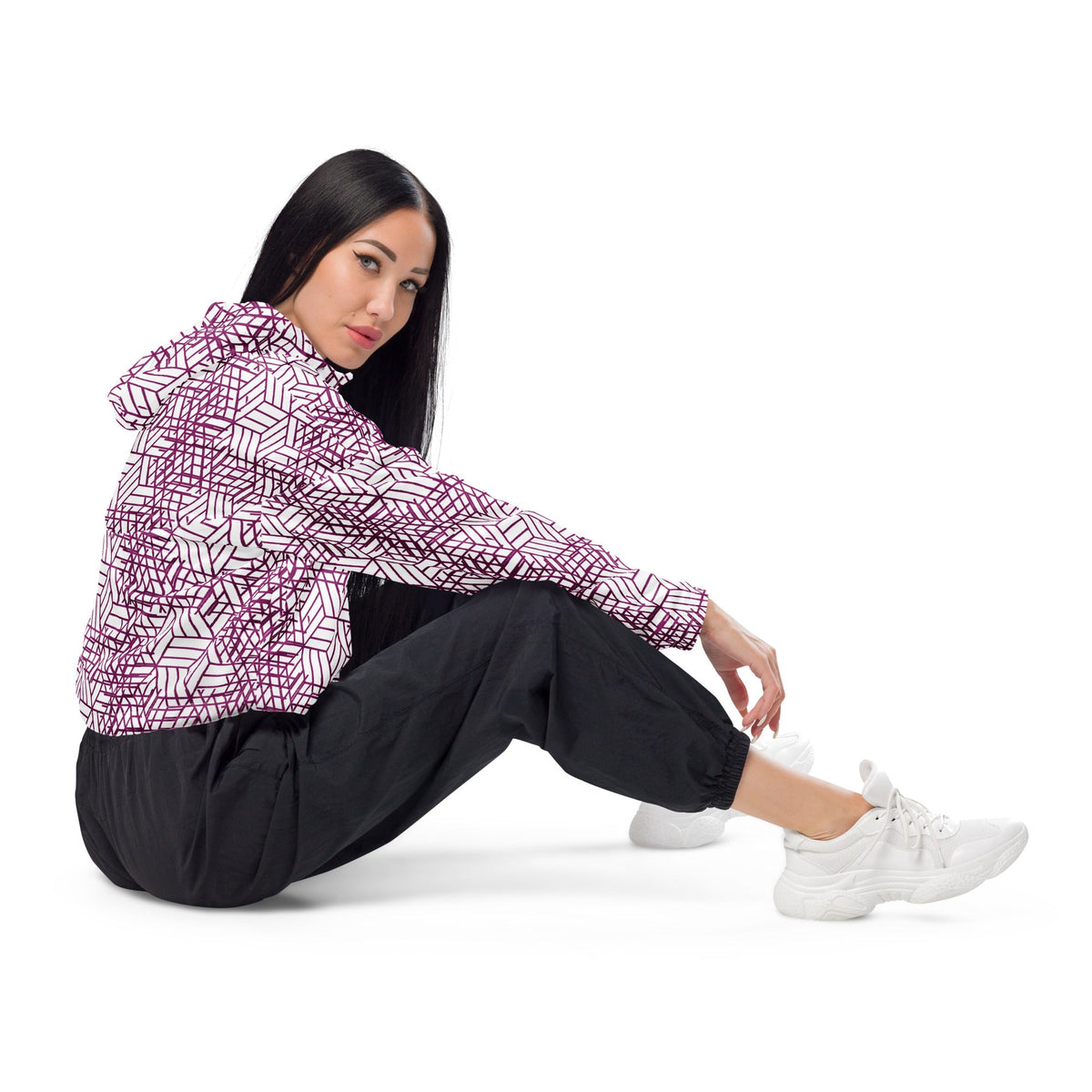 Good Wishes 365 cropped windbreaker with purple geometric trapezoidal print, hood, and half-zip, worn by a model.