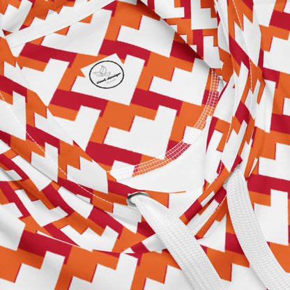 Good Wishes 365 unisex hoodie featuring a vibrant red and orange geometric heart pattern on recycled fabric
