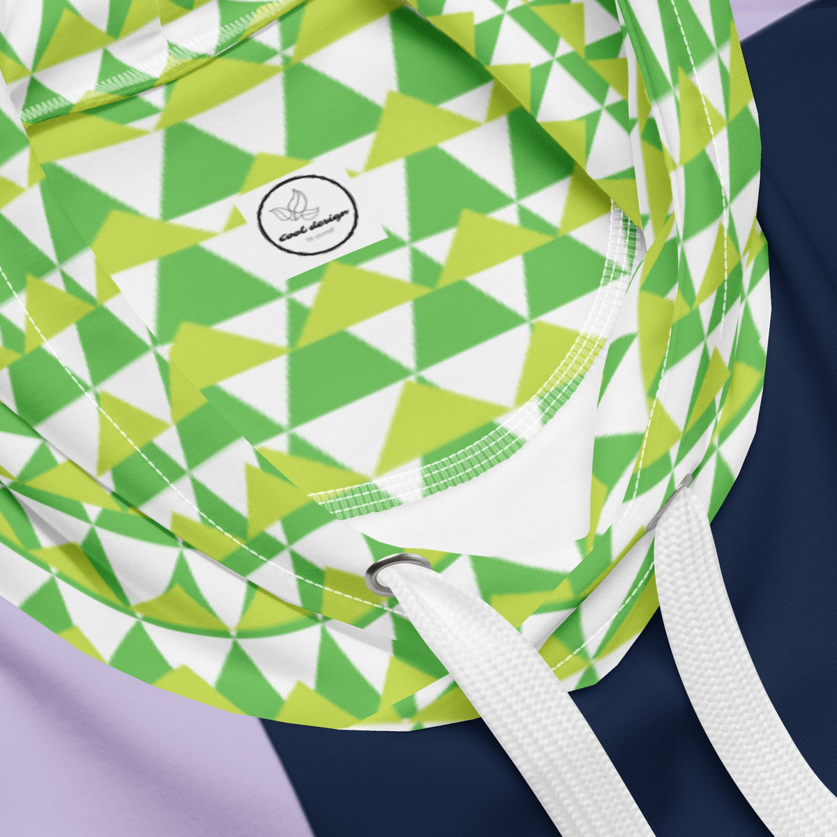 Good Wishes 365 green geometric 80s Memphis style hoodie with white drawstrings and recycled fabric