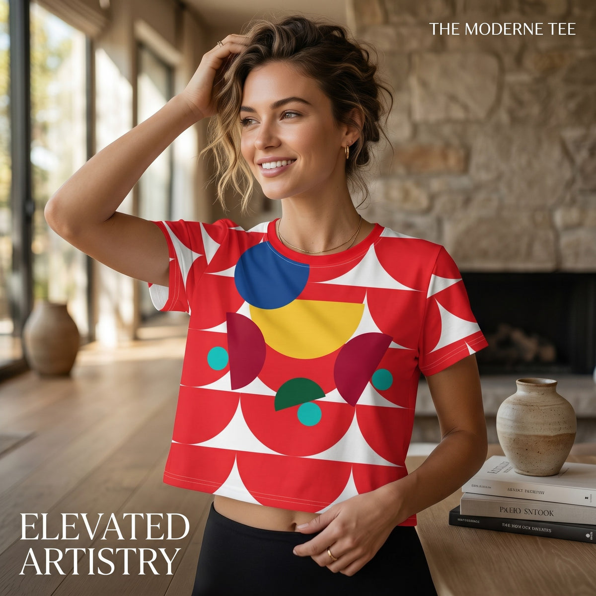 Good Wishes 365 red geometric mushroom print crop tee worn by a smiling woman in a bright living room setting.