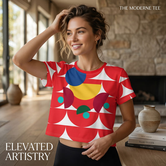 Good Wishes 365 red geometric mushroom print crop tee worn by a smiling woman in a bright living room setting.