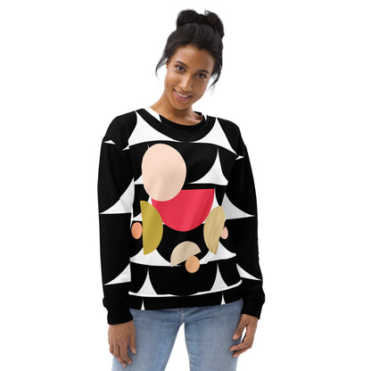 Good Wishes 365 black recycled sweatshirt with geometric mushroom graphic print worn by a smiling woman in jeans.