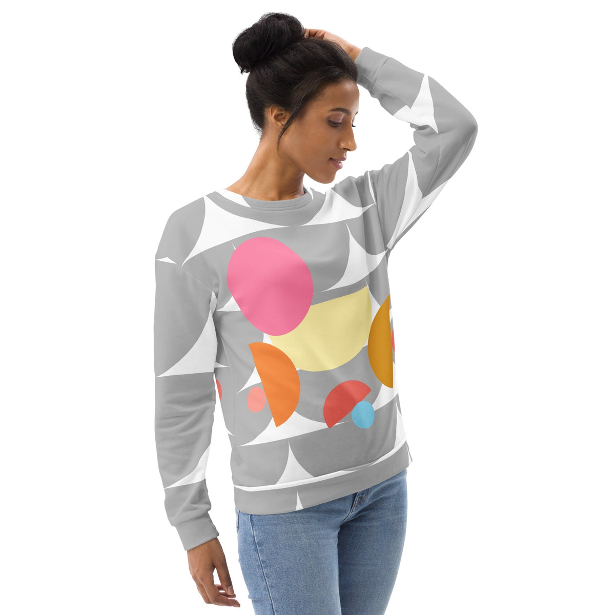 Good Wishes 365 recycled sweatshirt with silver geometric mushroom print and colorful shapes on a woman in jeans