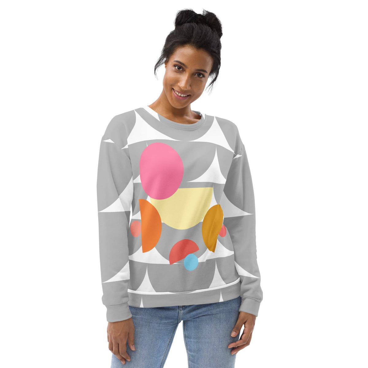 Good Wishes 365 recycled sweatshirt with silver geometric mushroom graphic print worn by a smiling woman in jeans