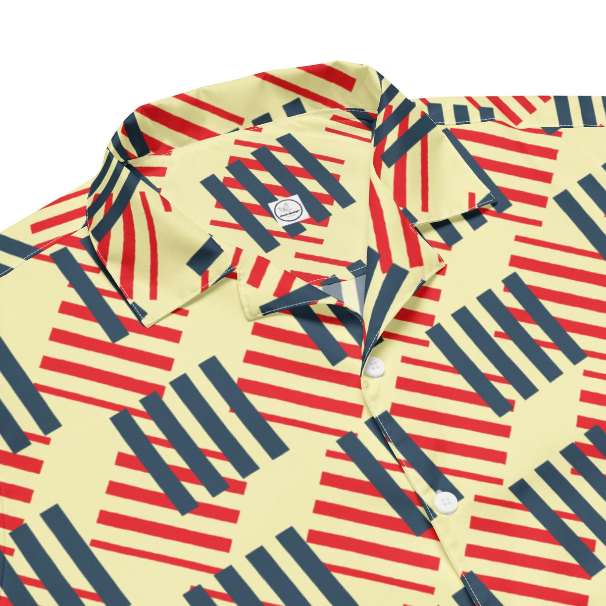 Good Wishes 365 short sleeve button down shirt with a cream, red, and navy geometric stripe pattern and camp collar.