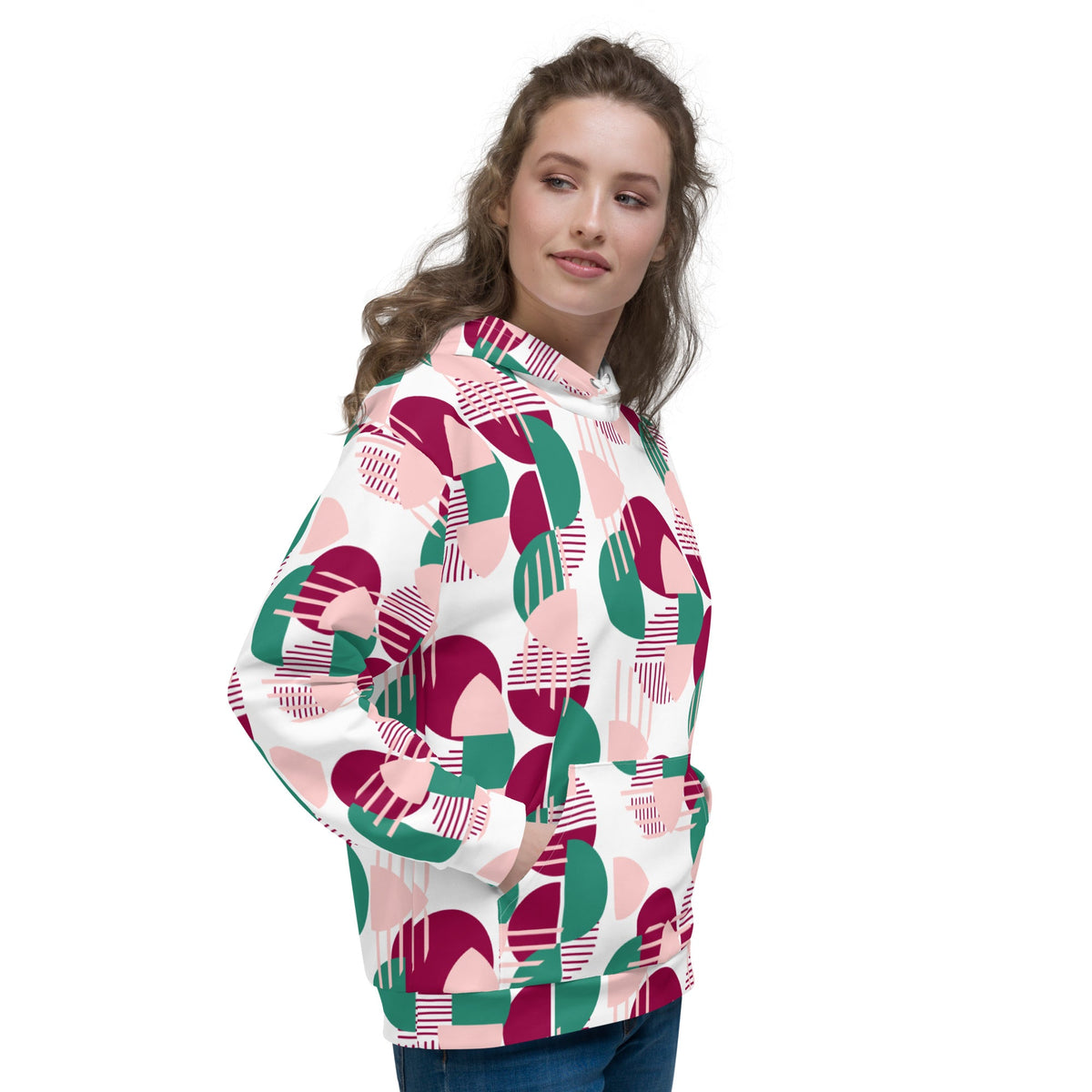 Good Wishes 365 recycled hoodie with pink, burgundy, and green geometric print worn by a woman.