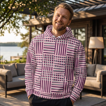 Good Wishes 365 recycled hoodie with purple and blue geometric stripes worn by a smiling man on a patio.