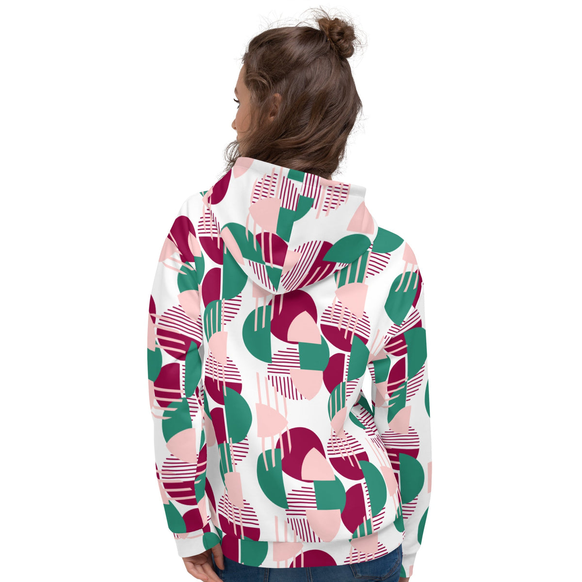 Good Wishes 365 recycled hoodie with pink, burgundy, and green geometric print worn by a woman, back view