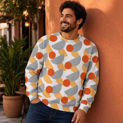 Good Wishes 365 men's recycled sweatshirt with orange, yellow, and grey geometric print worn by a smiling man