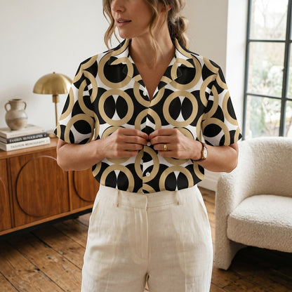 Good Wishes 365 unisex button shirt featuring a black, gold, and cream retro geometric print with UPF50+ protection.