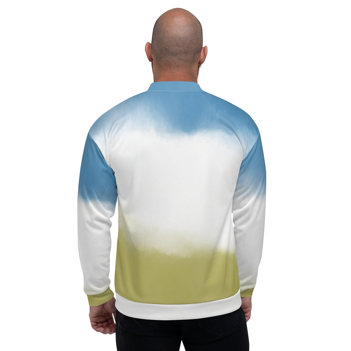 Back view of a Good Wishes 365 unisex bomber jacket with a blue sky and green grass gradient print on a model.