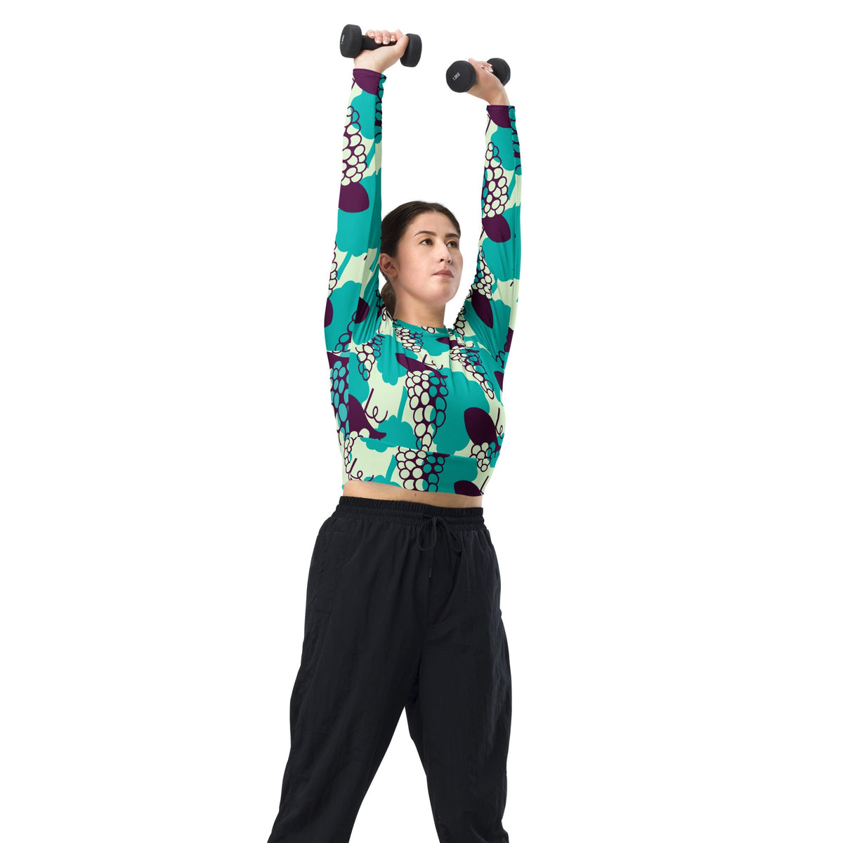 Good Wishes 365 long-sleeve crop top with grape print, featuring UPF 50+ recycled fabric and raglan sleeves.