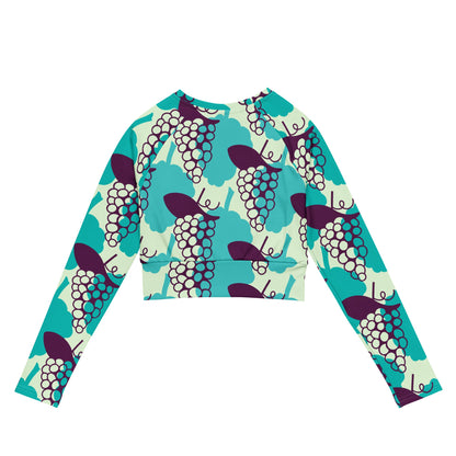 Good Wishes 365 long-sleeve crop top in recycled fabric with a vibrant purple and teal grape all-over print.