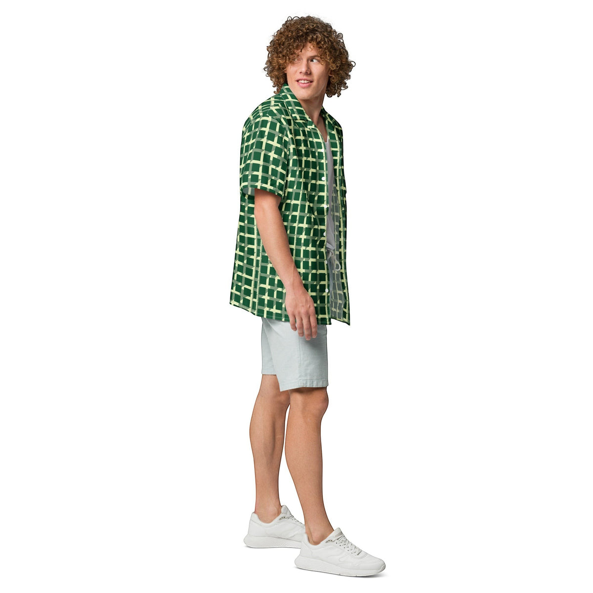 Good Wishes 365 men's green geometric checkered short sleeve button shirt worn open over a white tee with light shorts