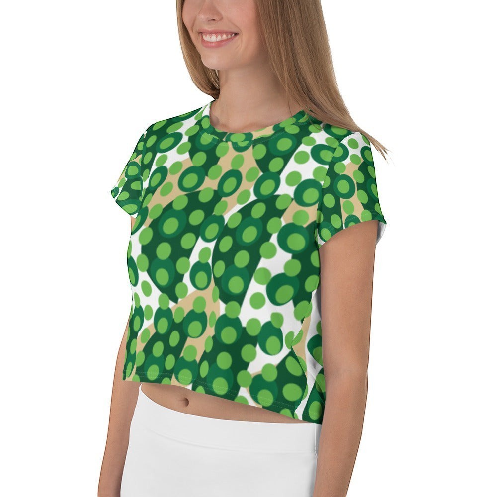 Good Wishes 365 green geometric polka dot crop tee with crew neck worn by a smiling woman