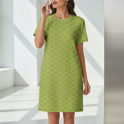 Good Wishes 365 green t-shirt dress with all-over monstera leaf print and dropped shoulders.