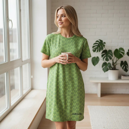 Good Wishes 365 green t-shirt dress with monstera leaf print, short sleeves, and relaxed fit.