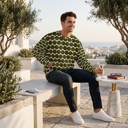 Good Wishes 365 unisex recycled sweatshirt in green and white pebble dot print worn by a man on a sunny terrace