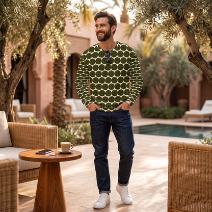 Good Wishes 365 unisex recycled sweatshirt in green and white pebble dot print worn by a man in a resort setting.