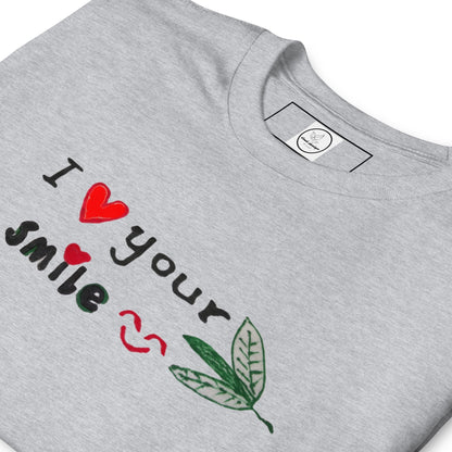Good Wishes 365 grey crewneck t-shirt with I Love Your Smile graphic featuring red hearts and green leaf accents.