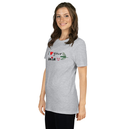 Good Wishes 365 unisex grey crewneck t-shirt with I Love Your Smile graphic, worn by a smiling woman.