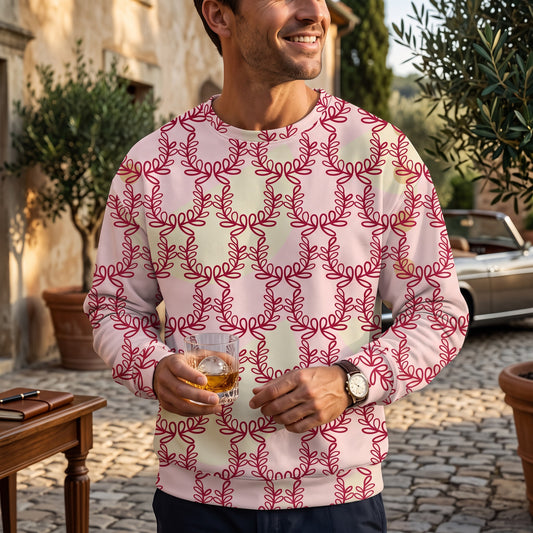 Good Wishes 365 unisex sweatshirt in misty rose with a deep red laurel leaf crown print worn by a smiling man