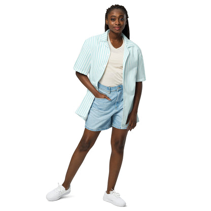 Good Wishes 365 all-over print light blue and white candy stripe short sleeve button-up shirt worn by a woman with denim shorts