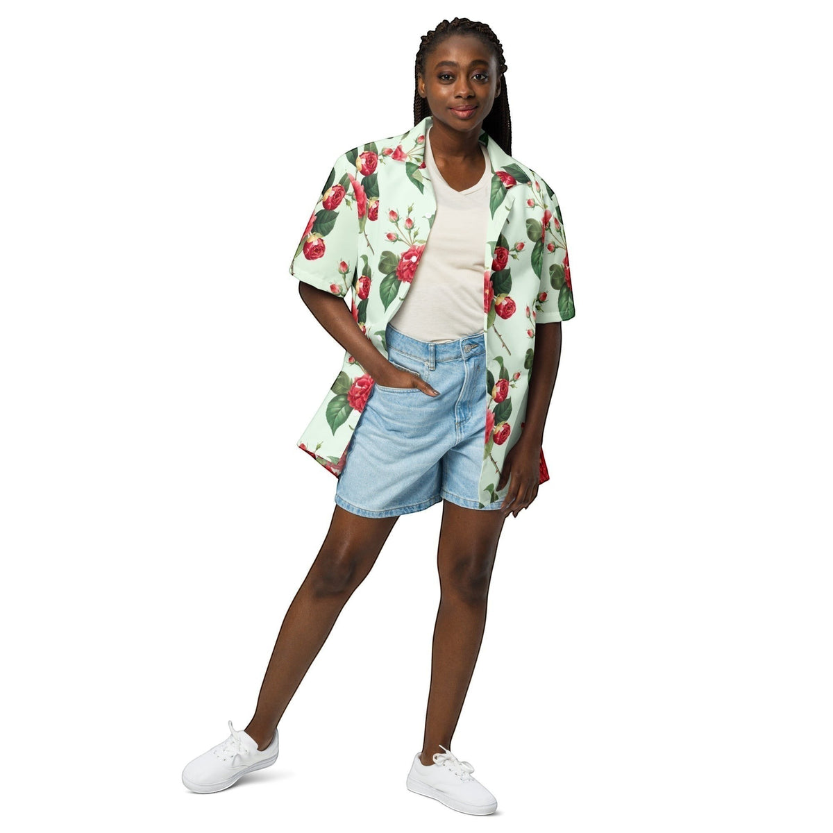 Good Wishes 365 mint green short sleeve shirt with red rose floral print worn open over a white top and denim shorts