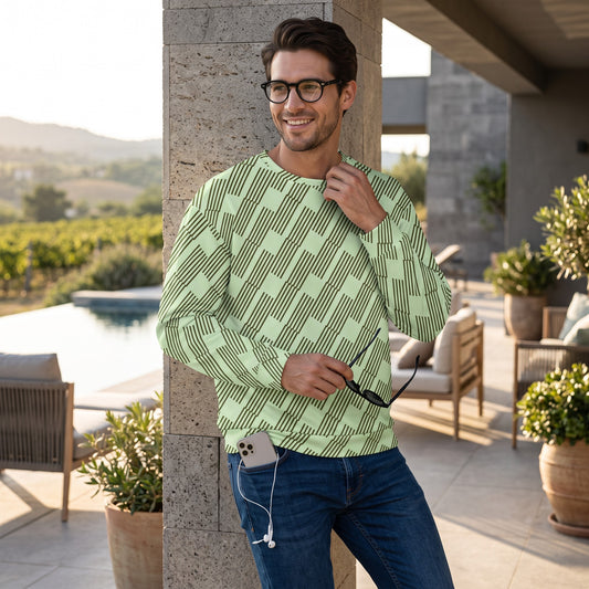 Good Wishes 365 mint geometric print recycled unisex sweatshirt worn by a smiling man on a sunny patio.