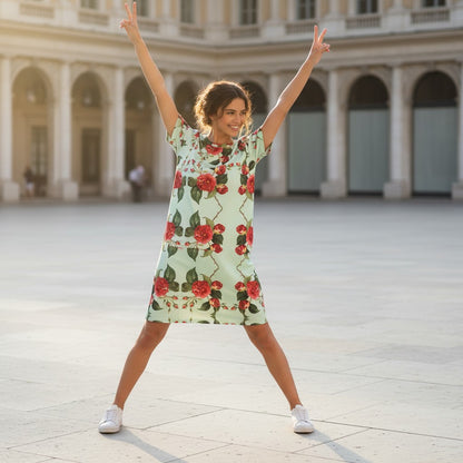 Good Wishes 365 light mint green t-shirt dress with a repeating red floral pattern and drop shoulders.
