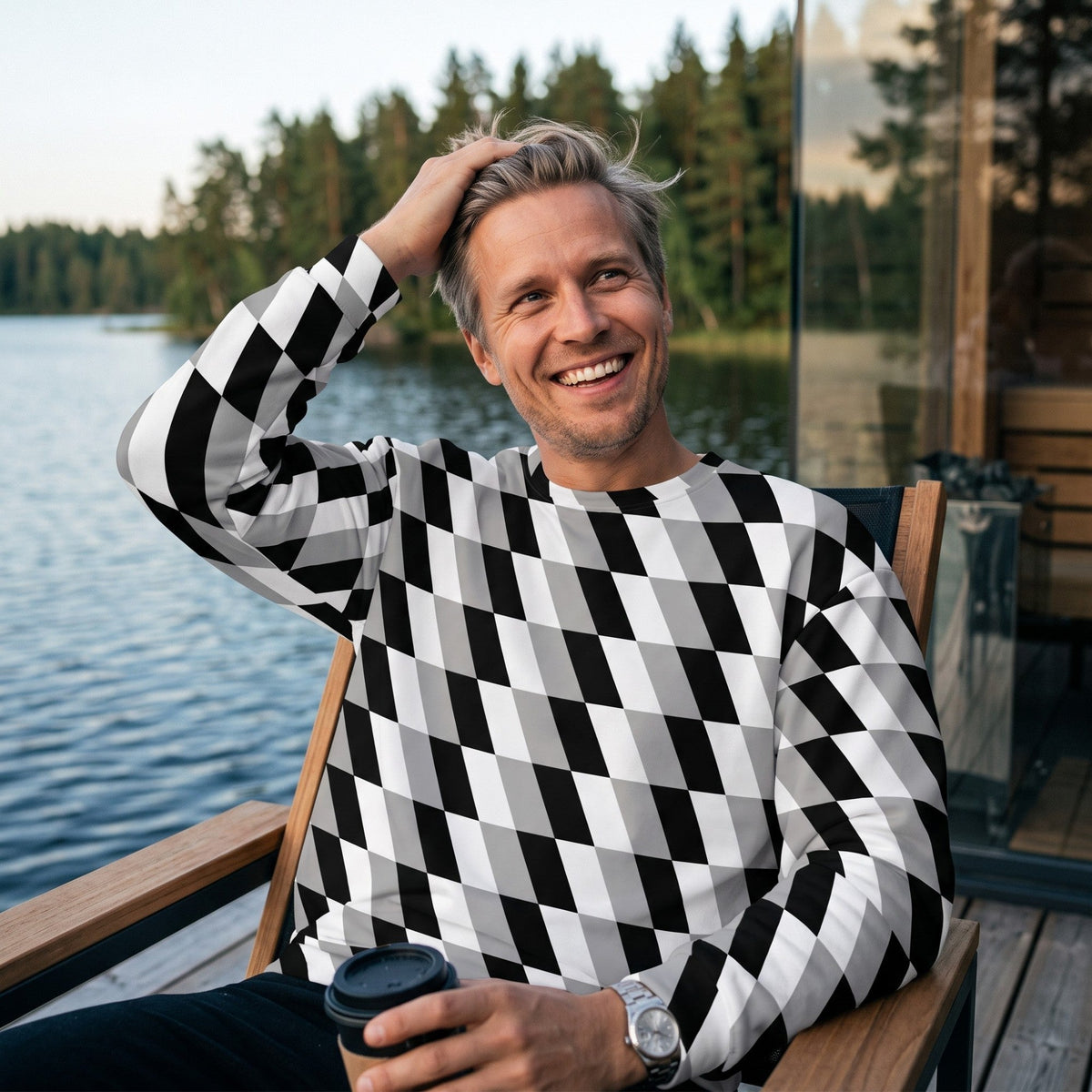 Good Wishes 365 unisex sweatshirt with a black, white, and gray optical illusion geometric print worn by a smiling man