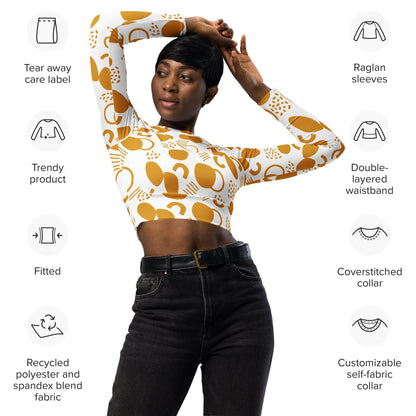 Good Wishes 365 mustard yellow abstract geometric print long-sleeve crop top worn by a model with feature icons
